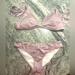 Victoria’s Secret size medium lavender bikini bathing suit.